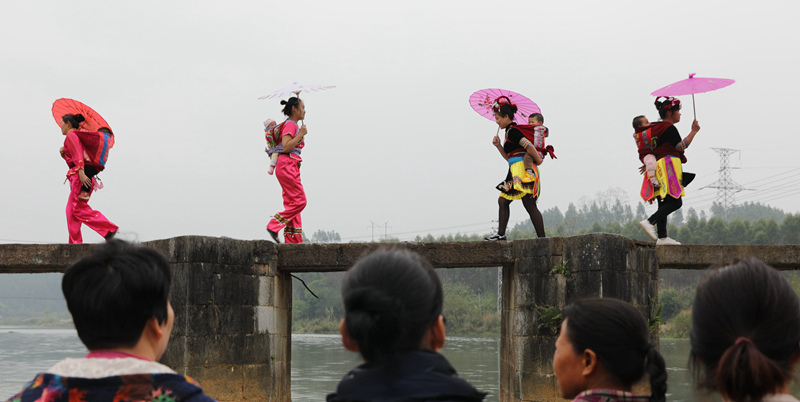 Residents in south China’s Guangxi stage folklore performances to pray for a bumper harvest