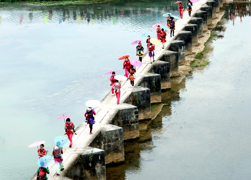 Residents in south China’s Guangxi stage folklore performances to pray for a bumper harvest