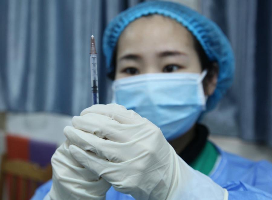 China has administered nearly 65 million COVID-19 vaccine doses