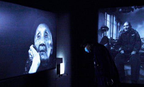 In pics: exhibition on Nanjing Massacre survivors