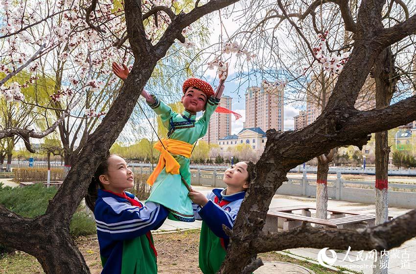 In pics: Pupils learn rod puppet skills in N China