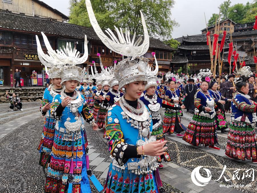 The traditional folk costumes of the Miao – “History worn on the