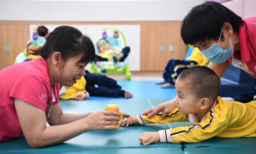 "Angel moms" for children at welfare center in Maoming, Guangdong