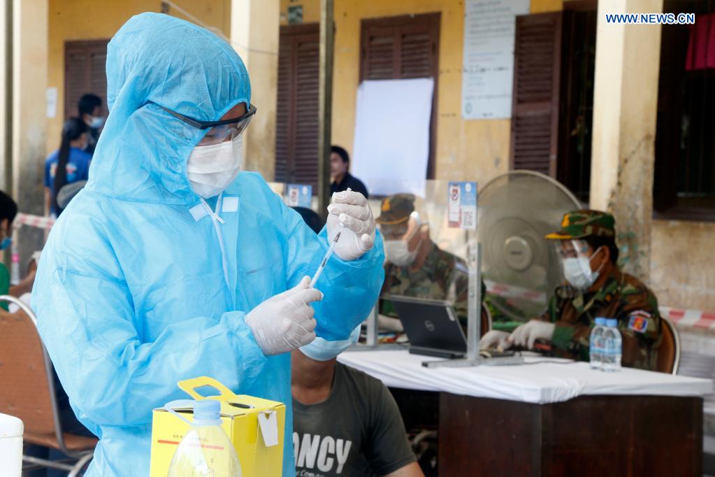 People receive Chinese COVID-19 vaccines in Phnom Penh, Cambodia