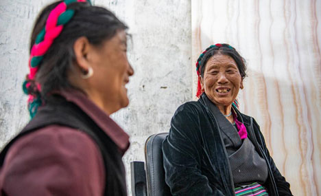 Former serf now enjoys happy life with family in Tibet