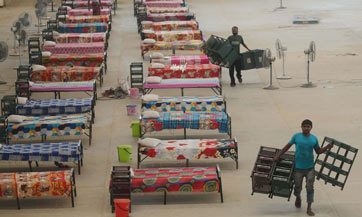 India reports over 390,000 new COVID-19 cases, tally over 19.5 million