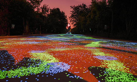 Fluorescent footpath glows under the night sky in Chongqing