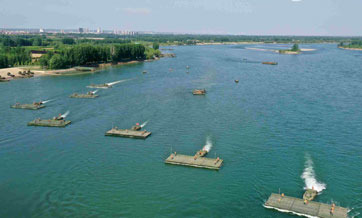 Pontoon troops deploy floating bridge