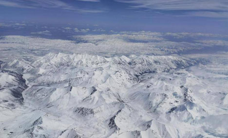 Snow blankets Qilian Mountains in early summer