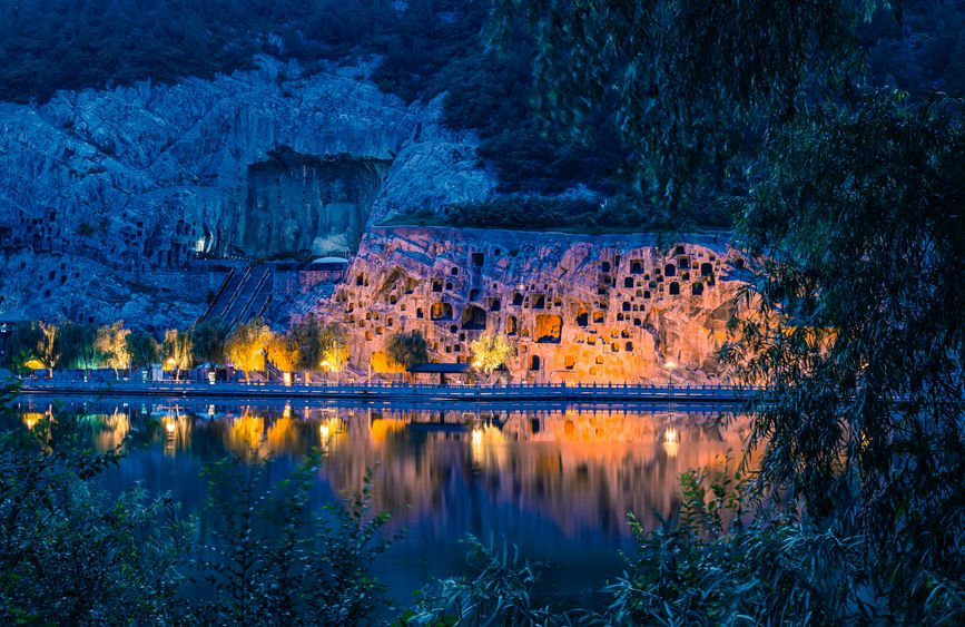 Grottoes in central China welcome vistors at dusk