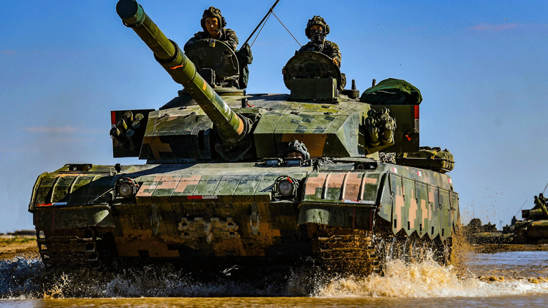 MBTs drive through mire