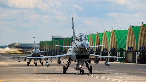 Fighter jets take off with suspension weights