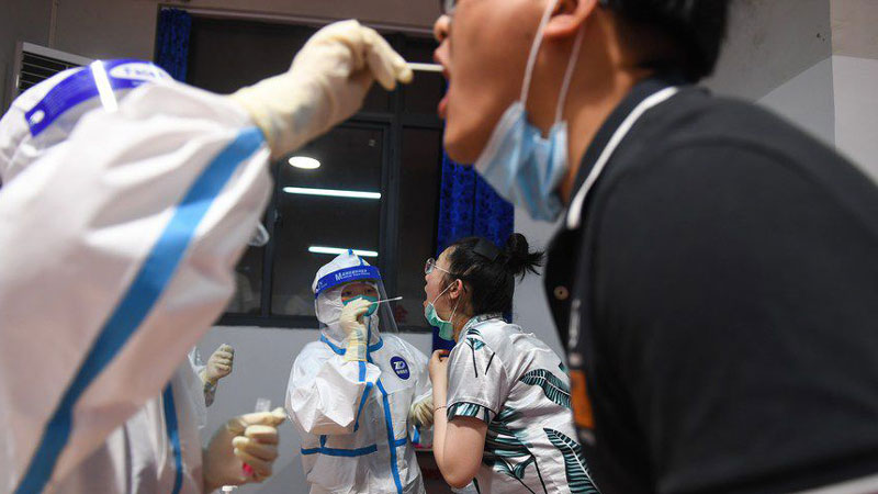 China's Nanjing tightens restrictive measures to stem spike in COVID-19 infections