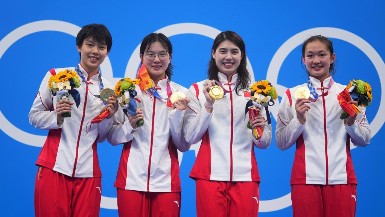 China shatters world record to win women's 4x200m freestyle relay at Tokyo Olympics
