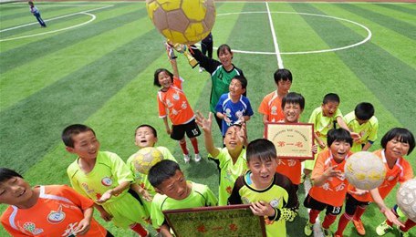 Principal of rural primary school realizes students’ football dream