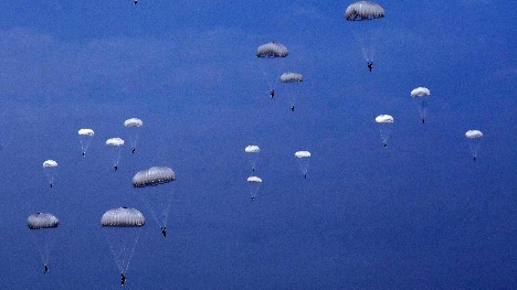 Paratroopers descend to landing zone