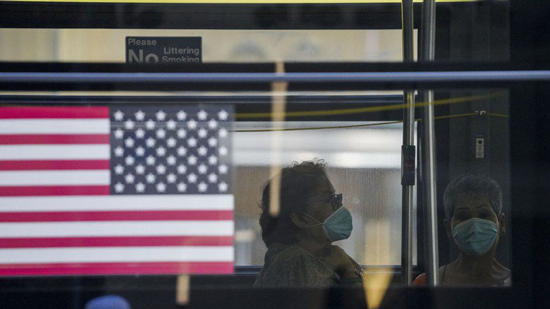 Americans divided in reaction to surge of COVID-19 variant cases