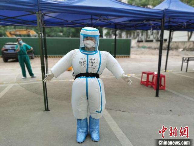 New protective suits keep medical workers cool during dog days of Wuhan’s nucleic acid testing drive