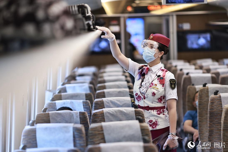 Train attendant witnesses changes brought by high-speed railway service in SW China