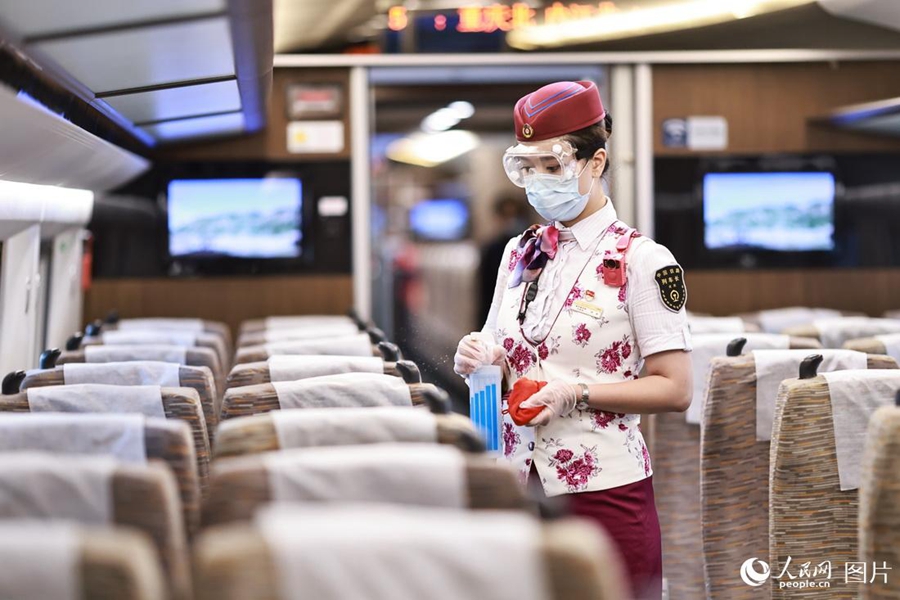 Train attendant witnesses changes brought by high-speed railway service in SW China