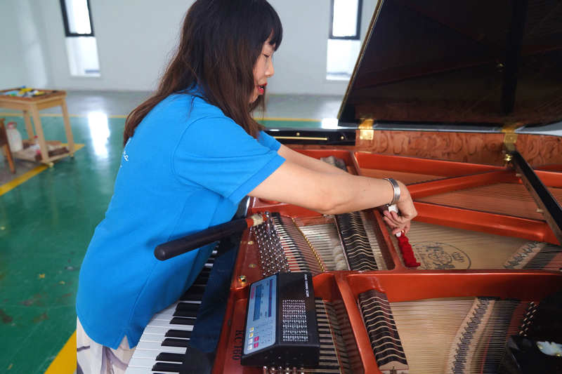 Migrant worker-turned-piano tuner fulfills her dreams in east China's Zhejiang Province
