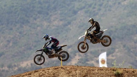 Racers compete during MXGP qualifying race at 2021 FIM Motocross World Championship