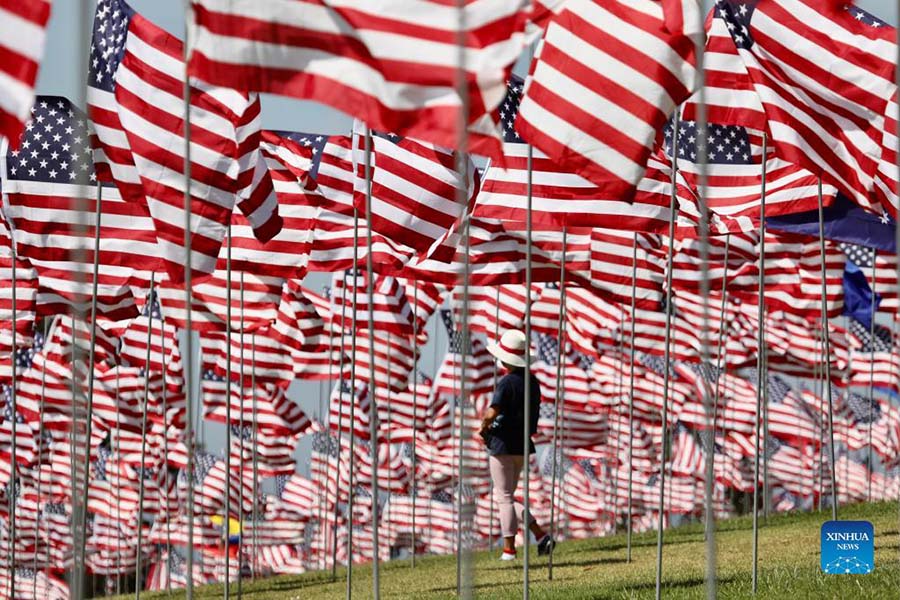 Waves of Flags displayed to honor victims of 9/11 attacks in U.S.