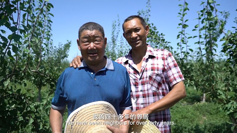 When neighbors become like family: a story of two farmers in Xinjiang  