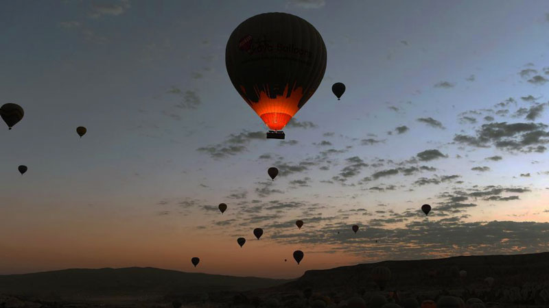 Hot-air balloons fly over Cappadocia, Turkey