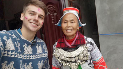 Young German man takes delight in videotaping traditional cultures of China's ethnic minority groups
