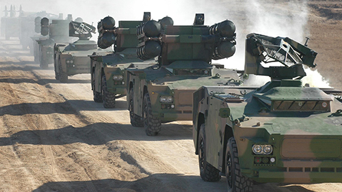 Military convoys maneuver for 72-hour field training