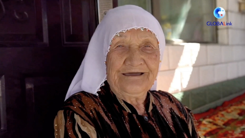 Xinjiang Speaks: At 100, her life is a bouquet of happiness
