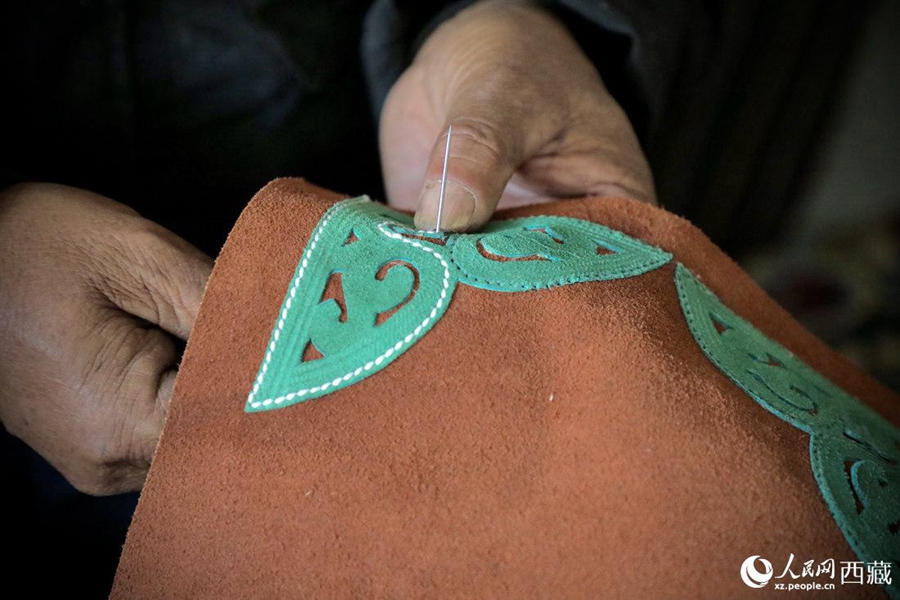 Traditional leather processing helps generate wealth for villagers in Lhasa, SW China's Tibet