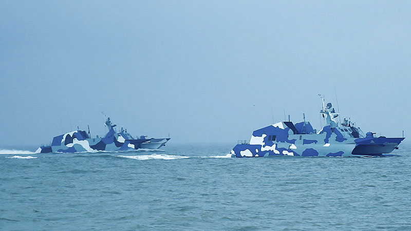 Fast attack missile boats steam in formation