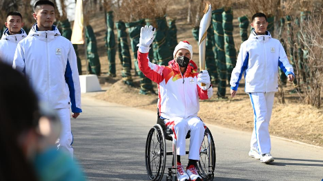 Winter Paralympic torch relay held in Beijing's Olympic Forest Park