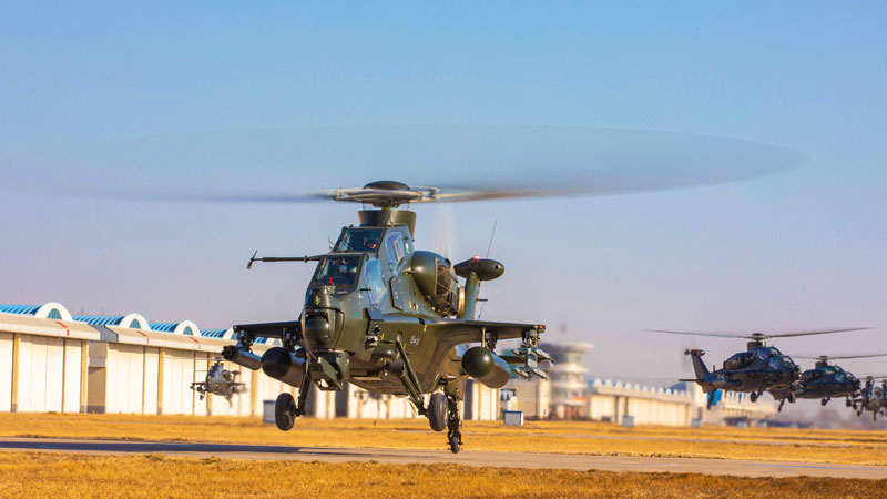 Attack helicopters fly in formation