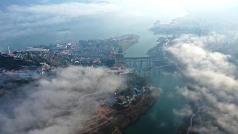 Village in Chongqing shrouded in advection fog