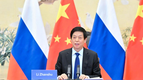 Top Chinese legislator holds talks with Russian Federation Council speaker