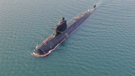 Submarine bears off port for maritime training drills