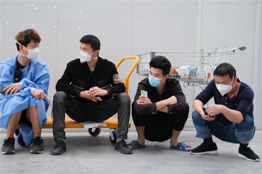 Moments of everyday life in a makeshift hospital in east China’s Shanghai