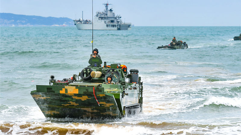 Army landing craft conducts ferrying and assault wave formation training