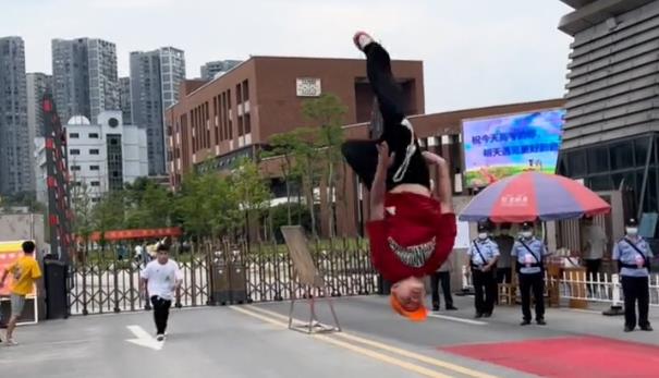 Martial arts students do somersaults after finishing college entrance exams