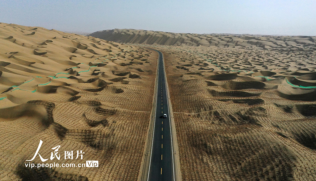 Expressway running across desert to open to traffic in China’s Xinjiang