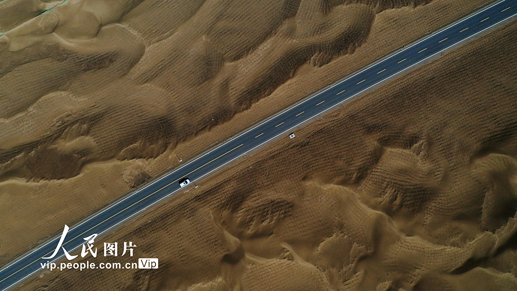 Expressway running across desert to open to traffic in China’s Xinjiang