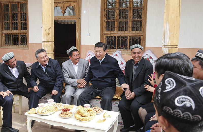 Xi: 'Hold together tightly like pomegranate seeds'