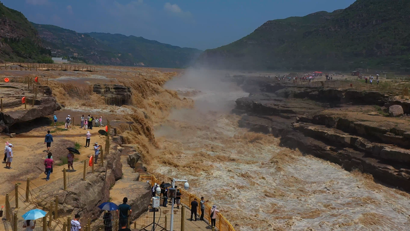Abundant water supply leads to spectacular views at Hukou Waterfall