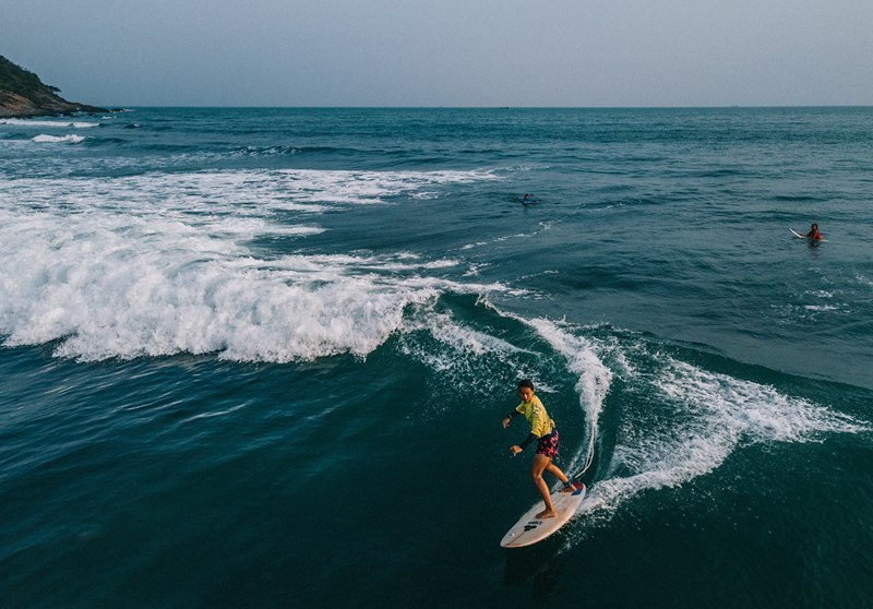Riyue Bay in south China’s Hainan becomes surfing mecca for Chinese youngsters looking for chance to ride the waves