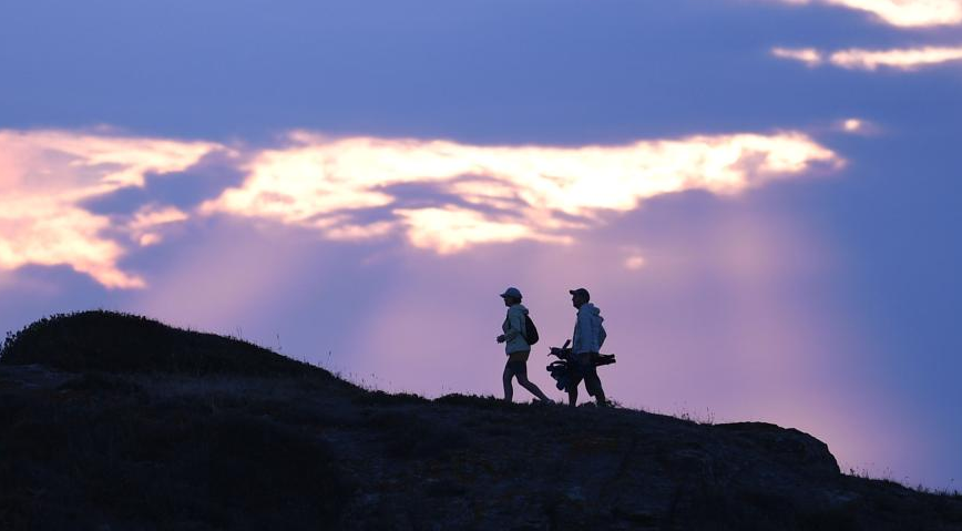 People enjoy scenery near Bosporus Strait in Istanbul, Türkiye