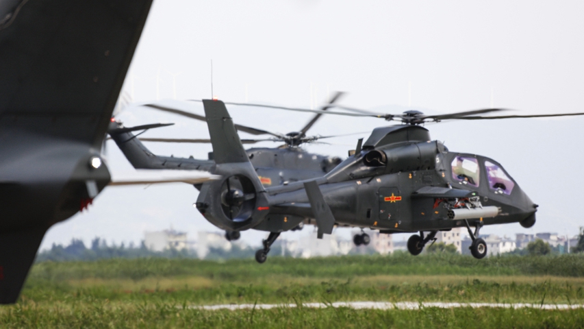 Army aviation helicopters engage in flight training