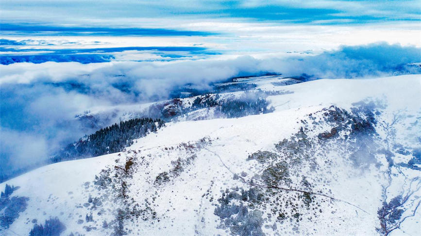 Snow turns Duolang Canyon in China's Xinjiang into 'colorful oil painting'